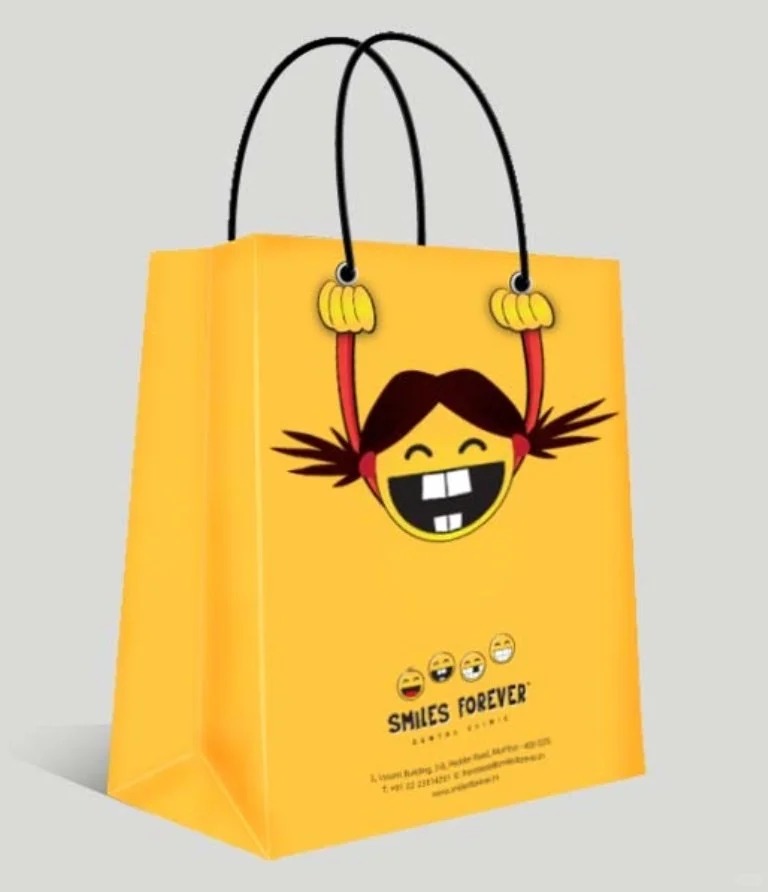 Bright Yellow Paper Gift Bag with Interactive Cartoon Smiling Girl Design